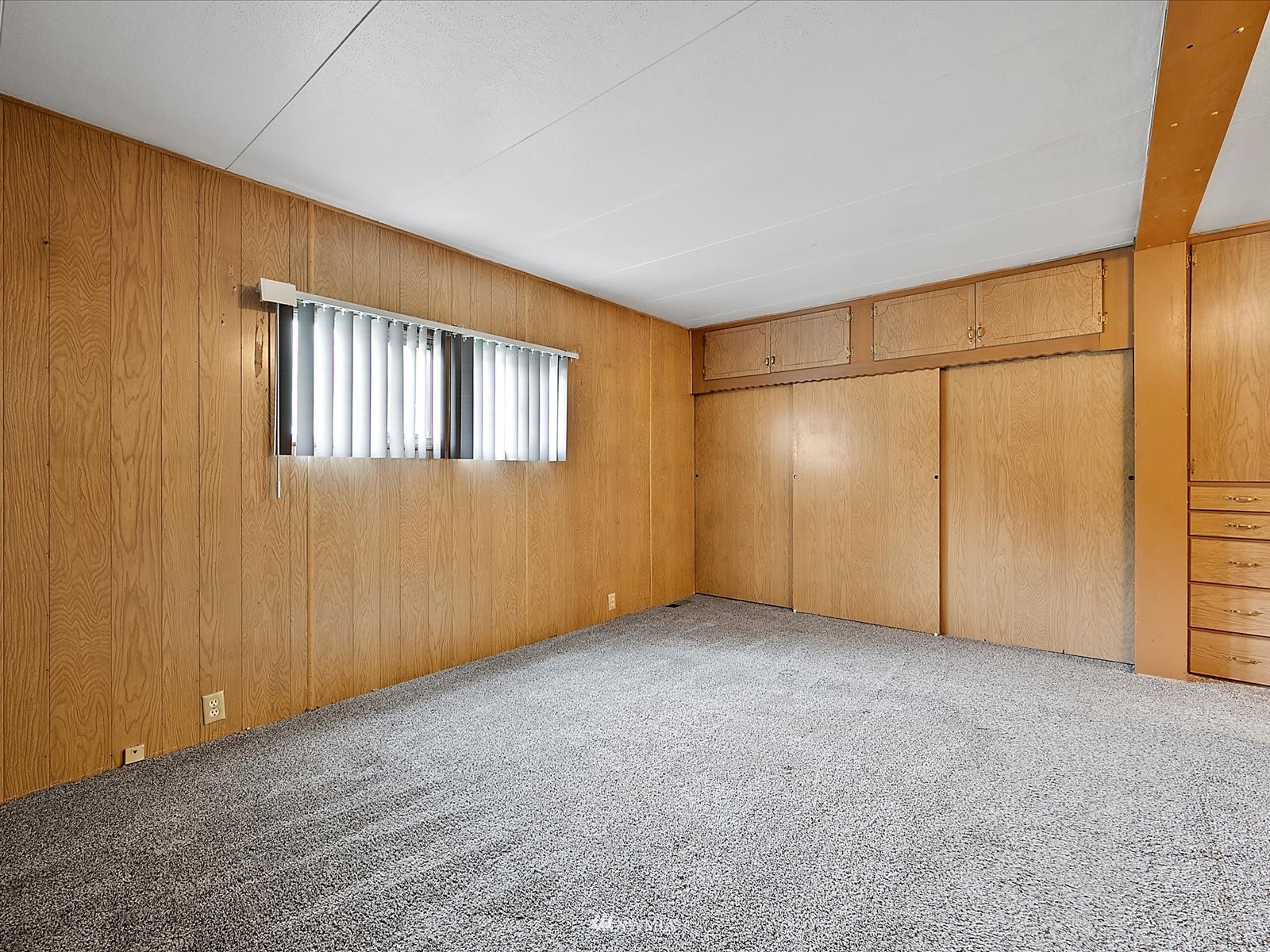 3333 228th Street Southeast, Unit 98 Bothell, WA 98021 - Photo 9 of 18 an empty room with windows