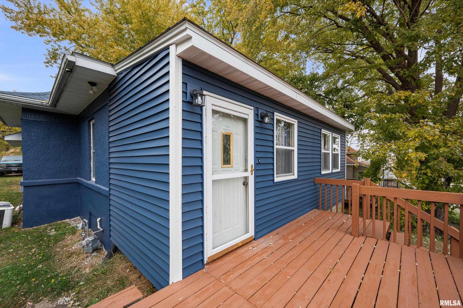 158 5th Street Silvis, IL 61282 - Photo 22 of 23 a view of a house with a deck