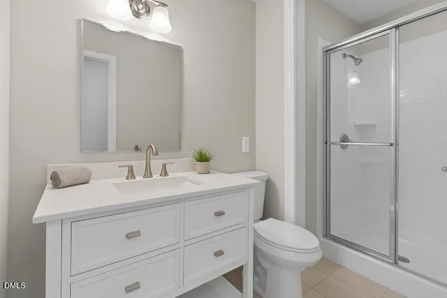 a view of a house with a yard and garage