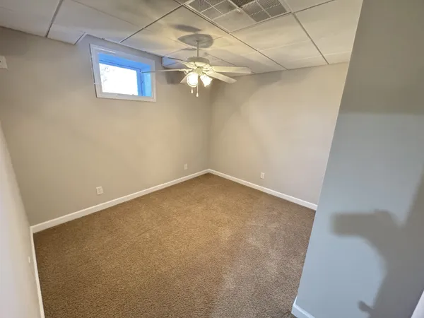 a balcony with wooden floor