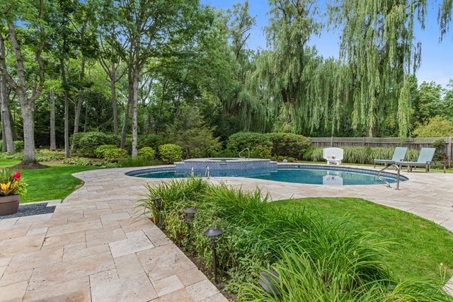 575 Turicum Road Lake Forest, IL 60045 - Photo 19 of 22 a view of a swimming pool with a patio