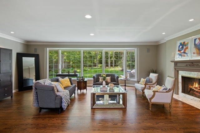 575 Turicum Road Lake Forest, IL 60045 - Photo 3 of 22 a living room with furniture and a fireplace