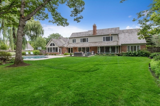 575 Turicum Road Lake Forest, IL 60045 - Photo 22 of 22 a front view of a building with garden and trees