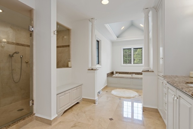 575 Turicum Road Lake Forest, IL 60045 - Photo 9 of 22 a bathroom with a granite countertop tub sink and mirror