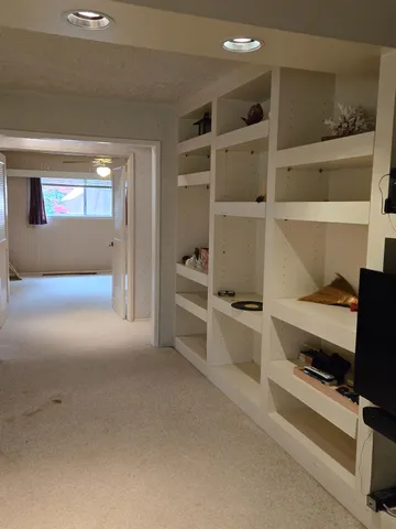 a view of a living room with furniture