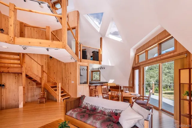 a outdoor space with patio the couches and a dining table with chairs