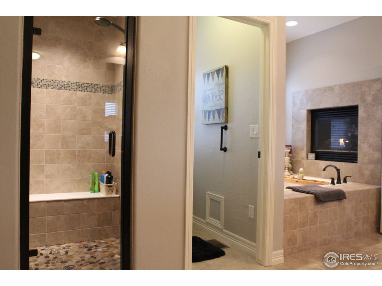 3319 Tranquility Way Berthoud, CO 80513 - Photo 24 of 40 a bathroom with a sink and a mirror