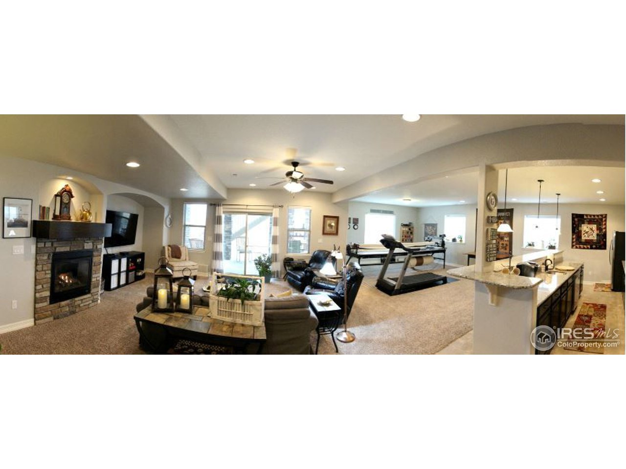 3319 Tranquility Way Berthoud, CO 80513 - Photo 35 of 40 a view of a living room and dining room