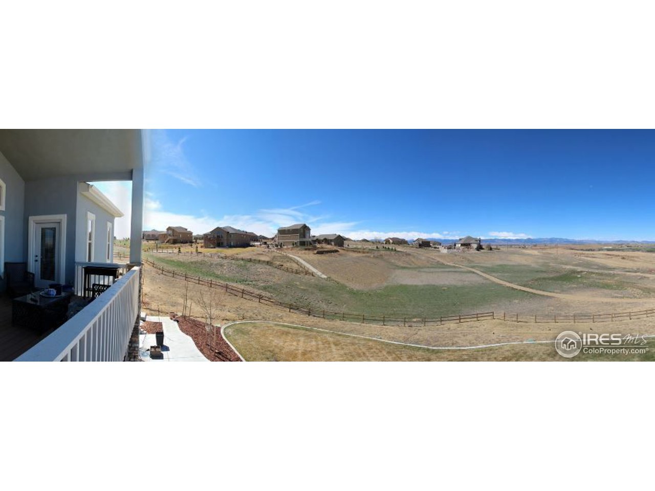 3319 Tranquility Way Berthoud, CO 80513 - Photo 39 of 40 a view of a living room and kitchen