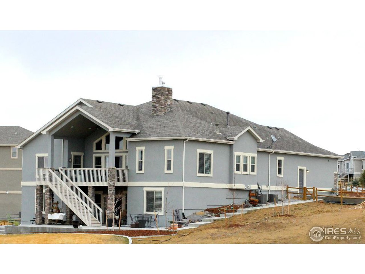 3319 Tranquility Way Berthoud, CO 80513 - Photo 6 of 40 a front view of a house with a yard