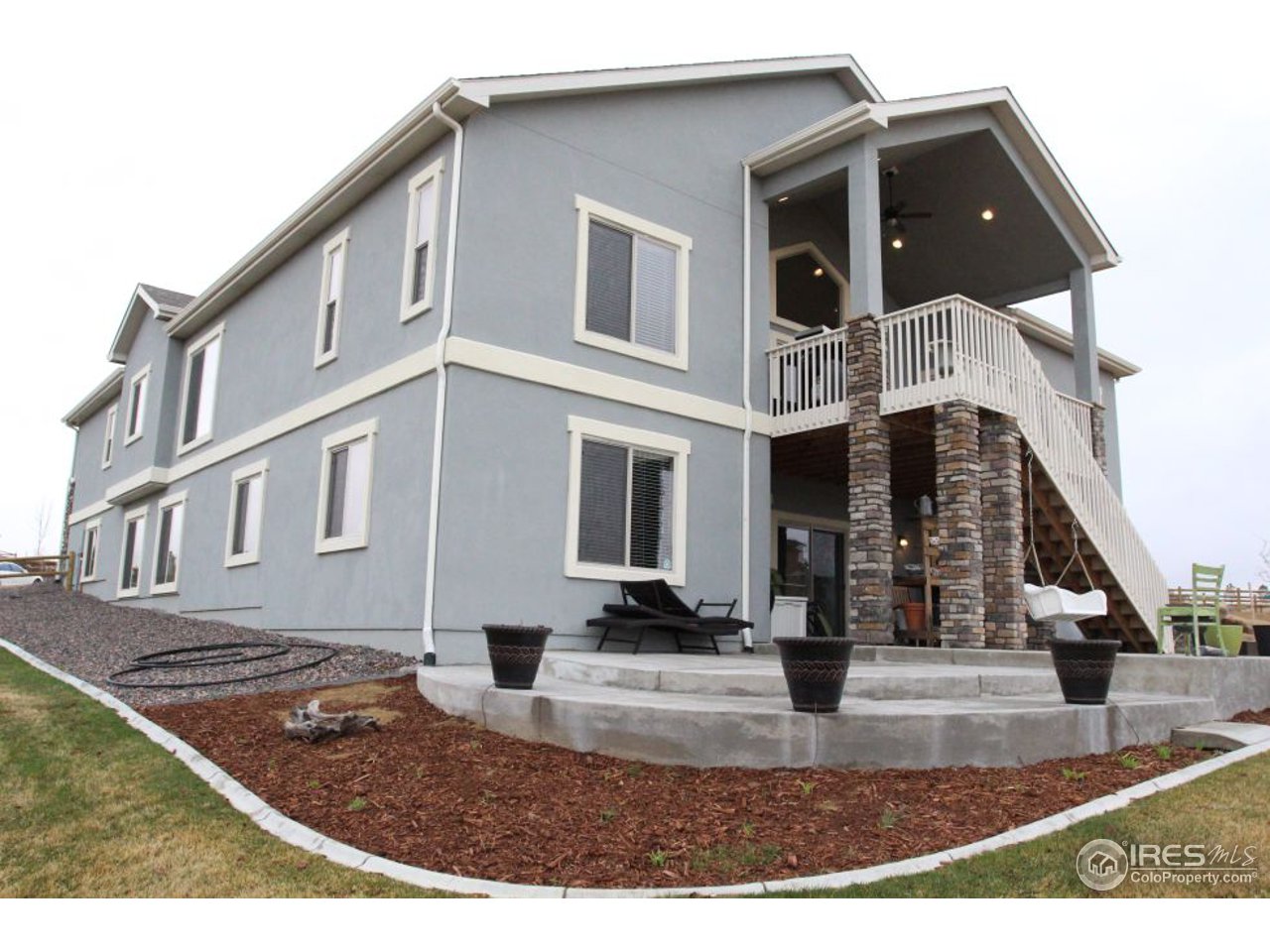 3319 Tranquility Way Berthoud, CO 80513 - Photo 7 of 40 a building view with a outdoor space