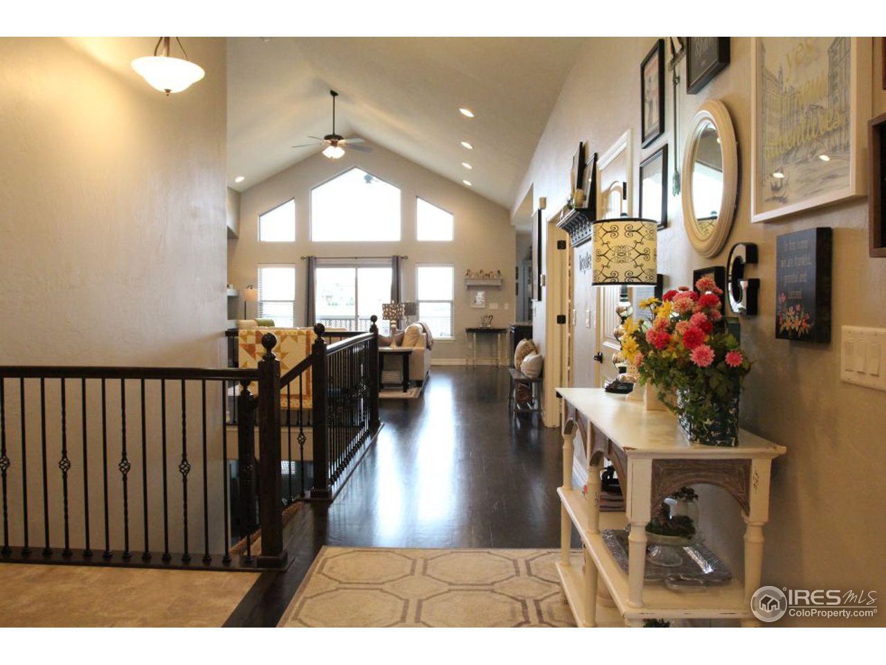 3319 Tranquility Way Berthoud, CO 80513 - Photo 10 of 40 a lobby with furniture and floor to ceiling window