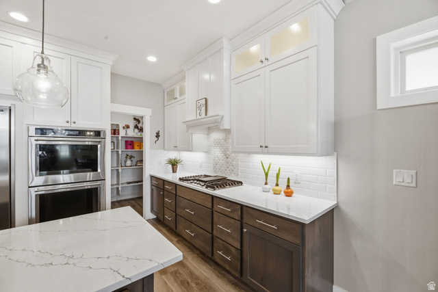 2109 Sunflower Lane Mapleton, UT 84664 - Photo 20 of 43 Gourmet Kitchen w/Gas Cooktop, Double Wall Oven, Extra Large Built-in Refrigerator/Freezer, Extra Long Island w/Farm Style Sink! Oversized Walk-in Pantry!