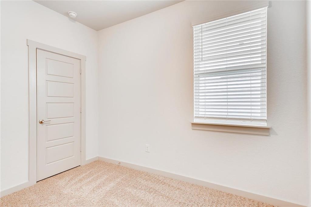 8033 Linnie Lane Austin, TX 78724 - Photo 9 of 17 an empty room with a window
