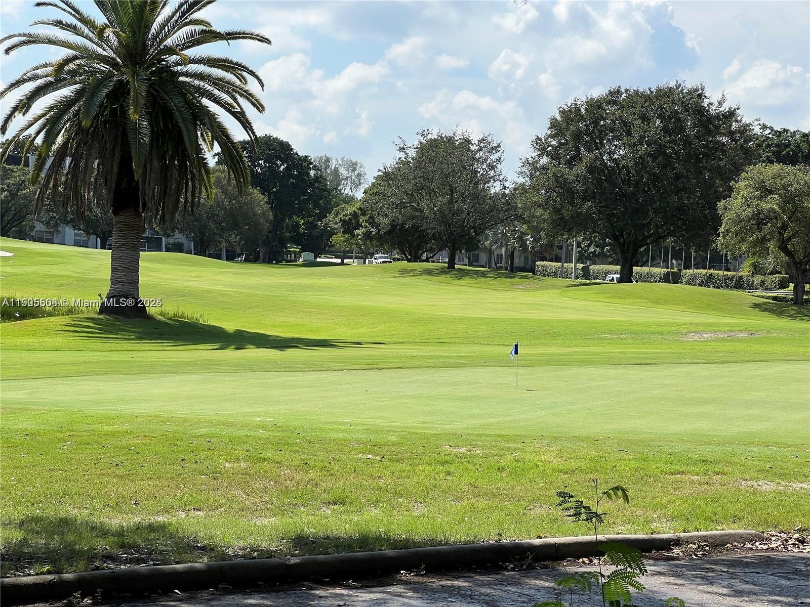 1830 Sabal Palm Drive, Unit 406 Davie, FL 33324 - Photo 12 of 16 a view of beach and ocean