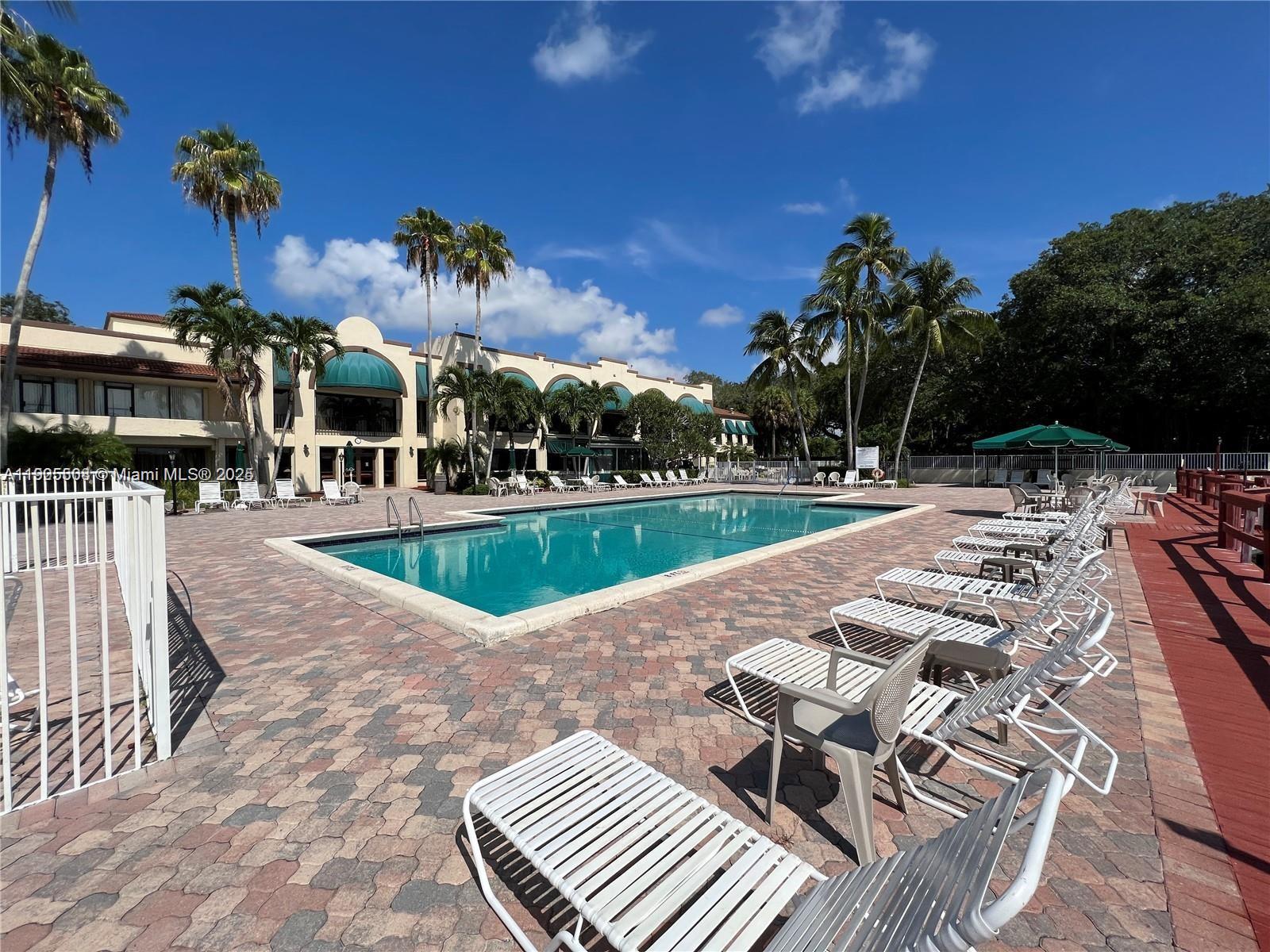 1830 Sabal Palm Drive, Unit 406 Davie, FL 33324 - Photo 16 of 16 an outdoor space with seating