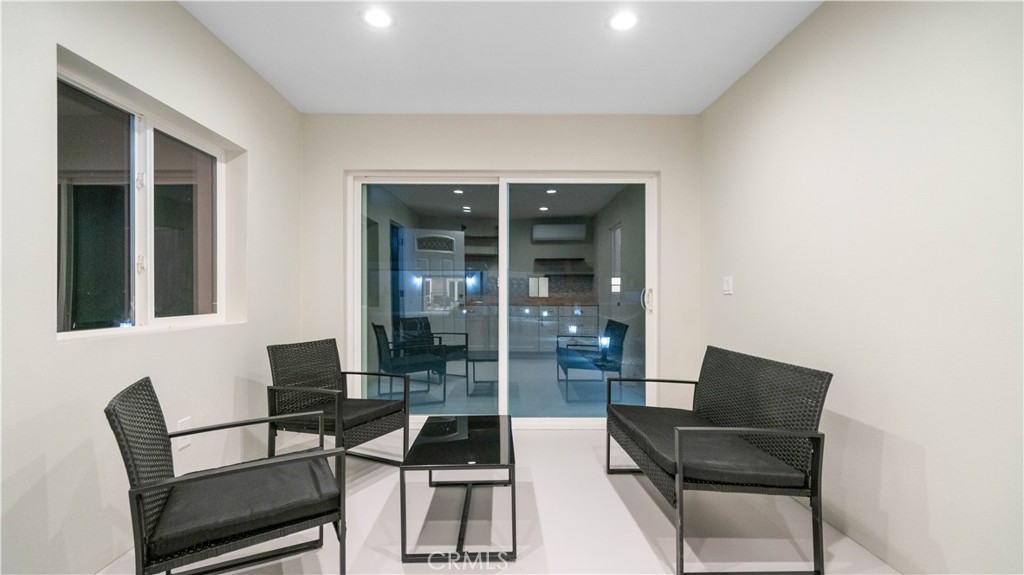 72160 Winters Road Twentynine Palms, CA 92277 - Photo 23 of 33 a living room with furniture and a potted plant