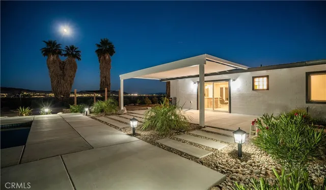 a view of a house with sitting area