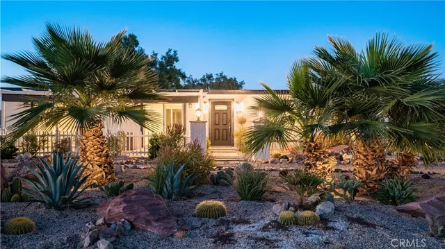 a view of a backyard of a house