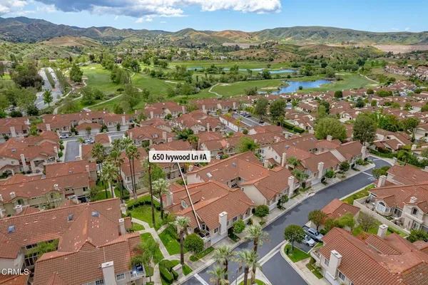 an aerial view of a city with lots of residential buildings