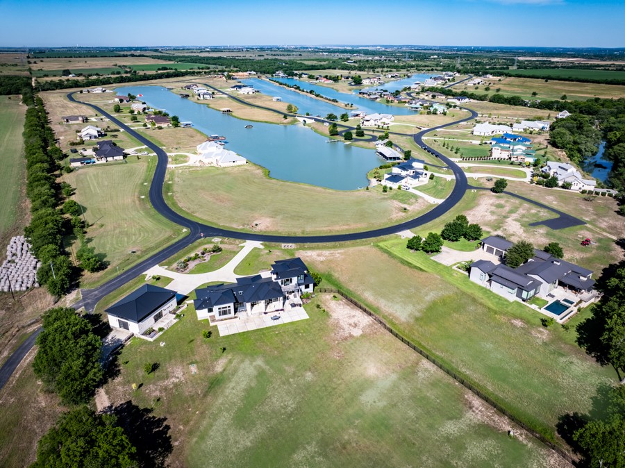 110 Rustic River Street Martindale, TX 78655 - Photo 11 of 28 View of property location with a large body of water and nearby suburban area
