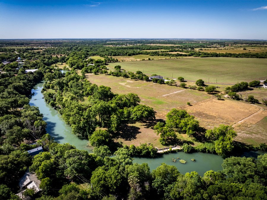 110 Rustic River Street Martindale, TX 78655 - Photo 18 of 28 View of rural area featuring a nearby body of water