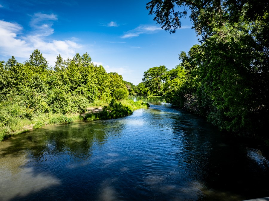 110 Rustic River Street Martindale, TX 78655 - Photo 26 of 28 Water view featuring a heavily wooded area