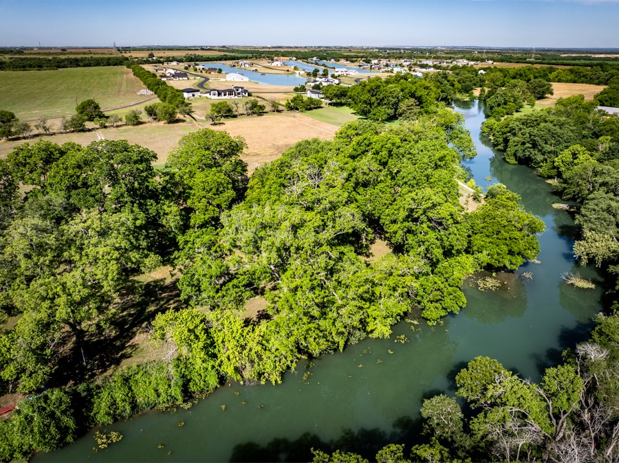110 Rustic River Street Martindale, TX 78655 - Photo 9 of 28 Aerial view of a large body of water