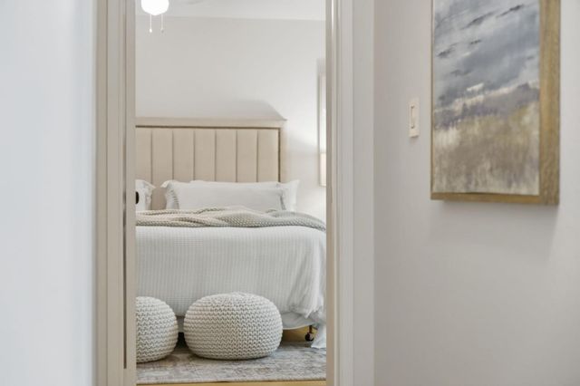 a bathroom with a toilet a sink and shower