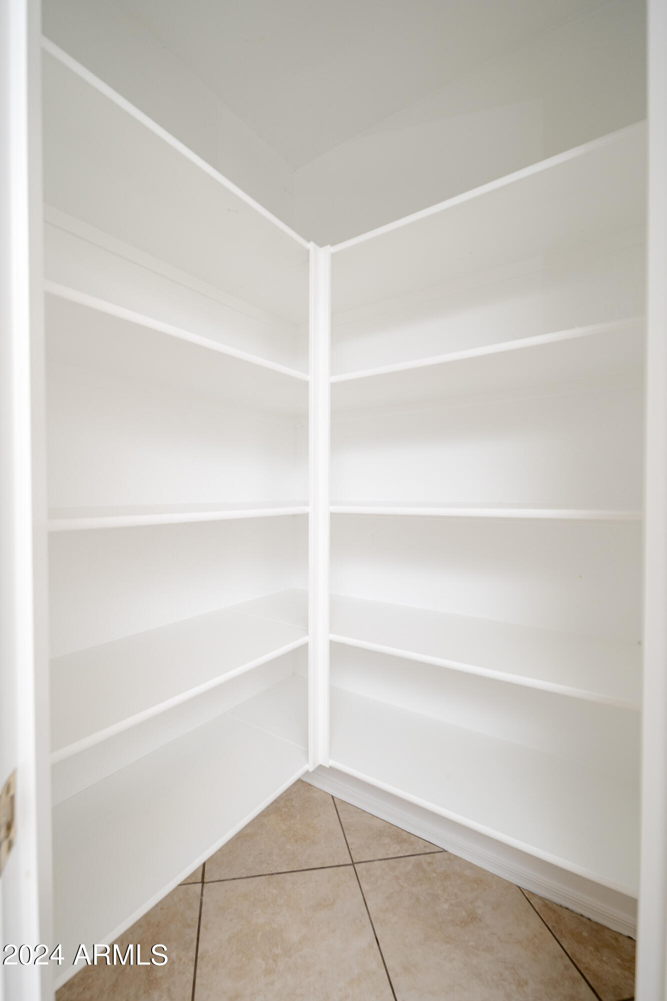 7208 West Crown King Road Phoenix, AZ 85043 - Photo 11 of 42 a view of an empty walk in closet