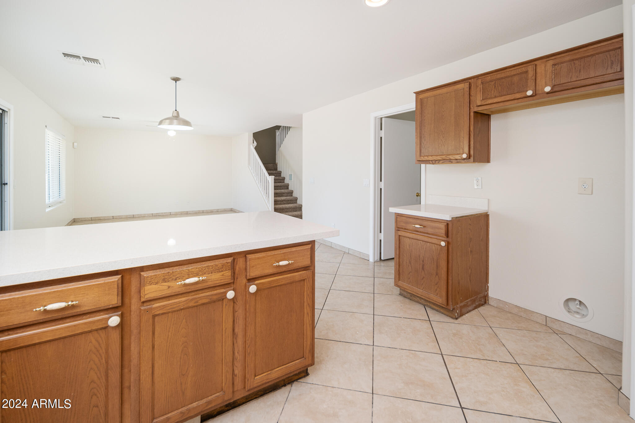 7208 West Crown King Road Phoenix, AZ 85043 - Photo 12 of 42 a kitchen with stainless steel appliances a sink and a counter top space