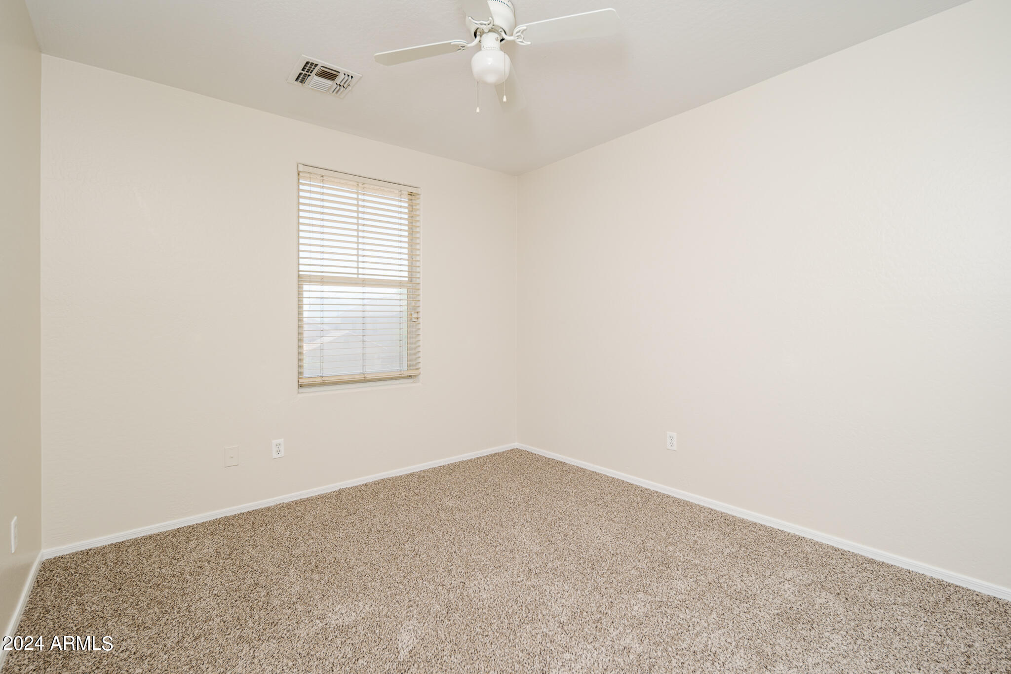 7208 West Crown King Road Phoenix, AZ 85043 - Photo 15 of 42 an empty room with a window