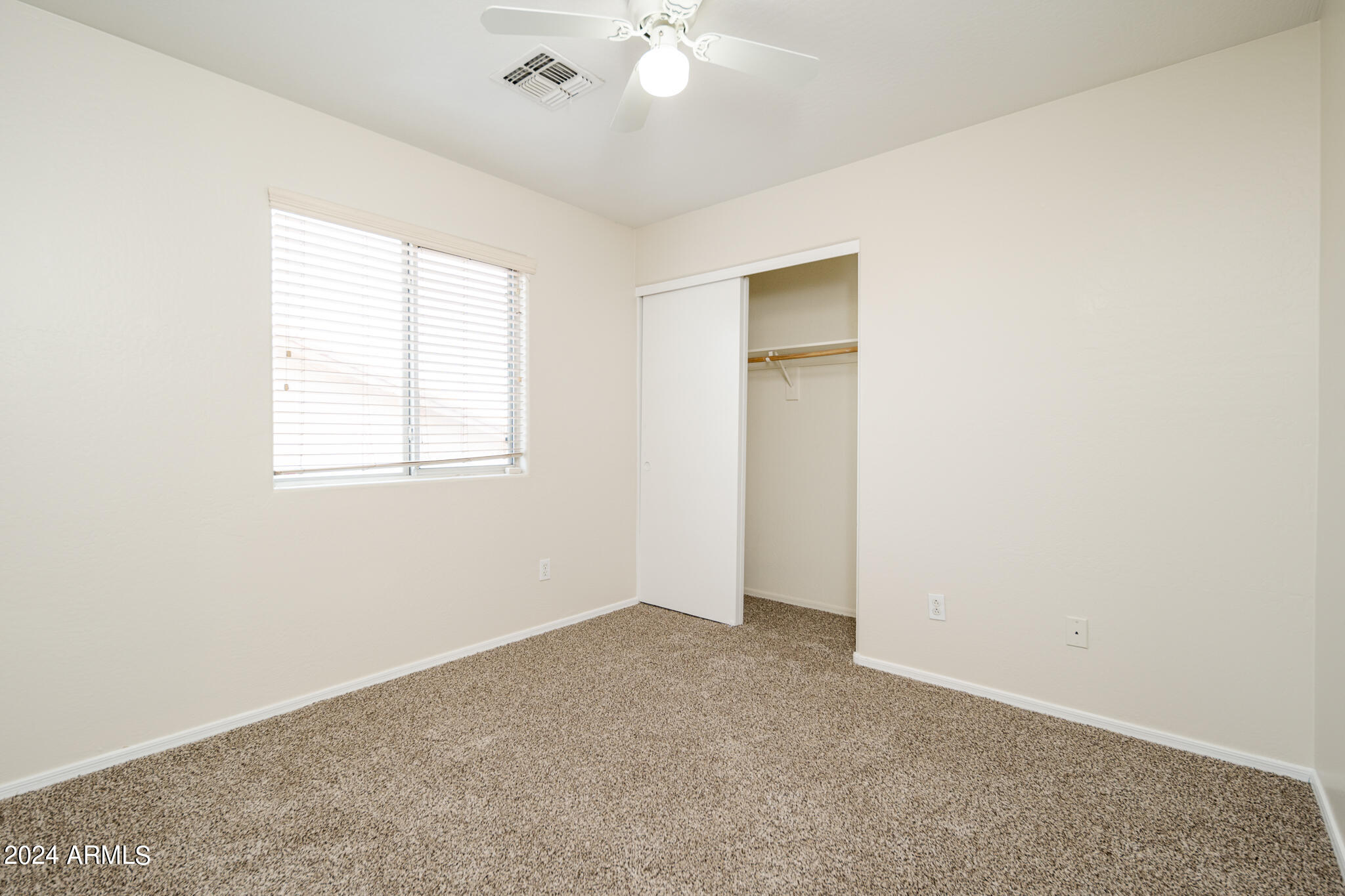 7208 West Crown King Road Phoenix, AZ 85043 - Photo 16 of 42 an empty room with a window