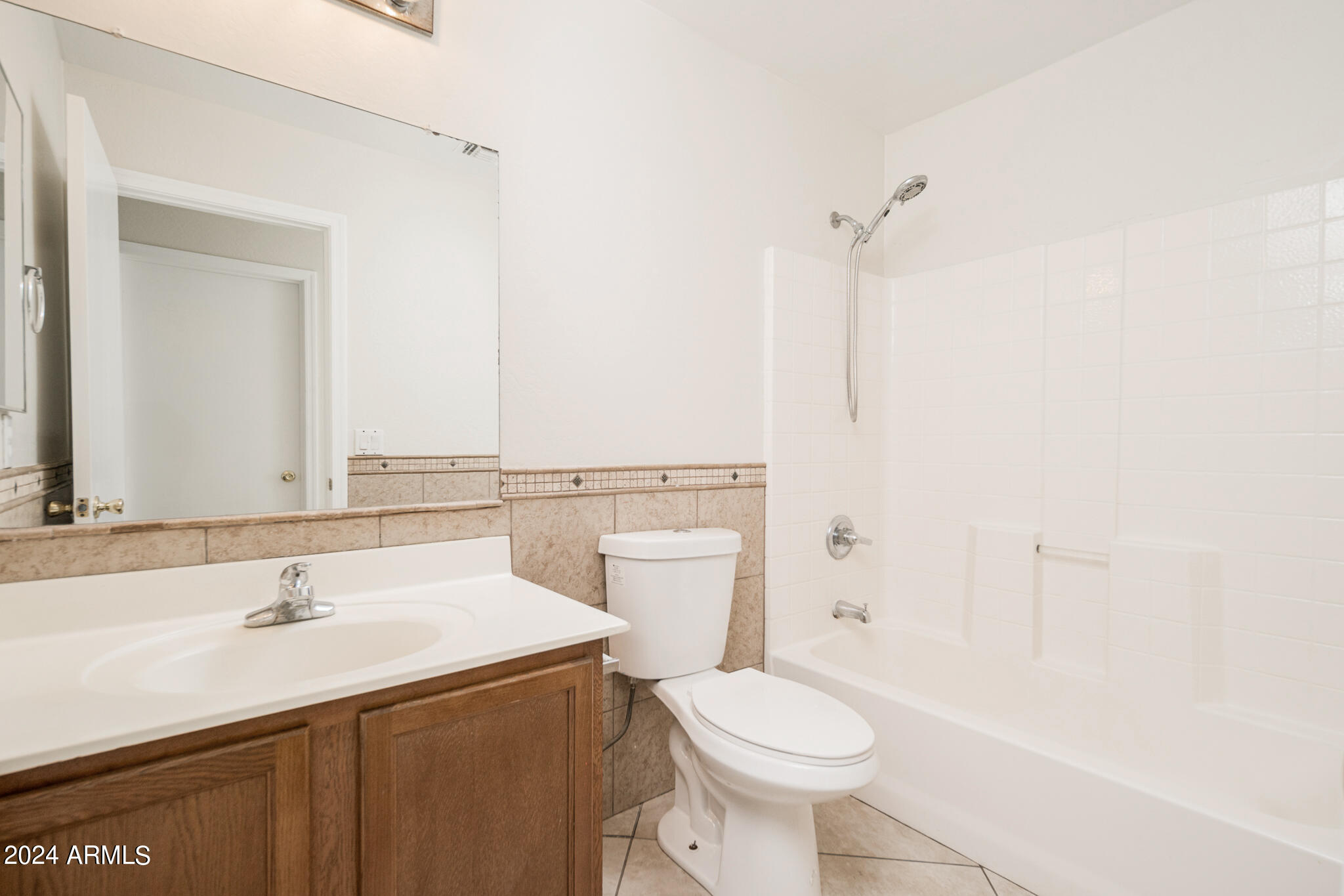 7208 West Crown King Road Phoenix, AZ 85043 - Photo 20 of 42 a bathroom with a sink toilet and shower