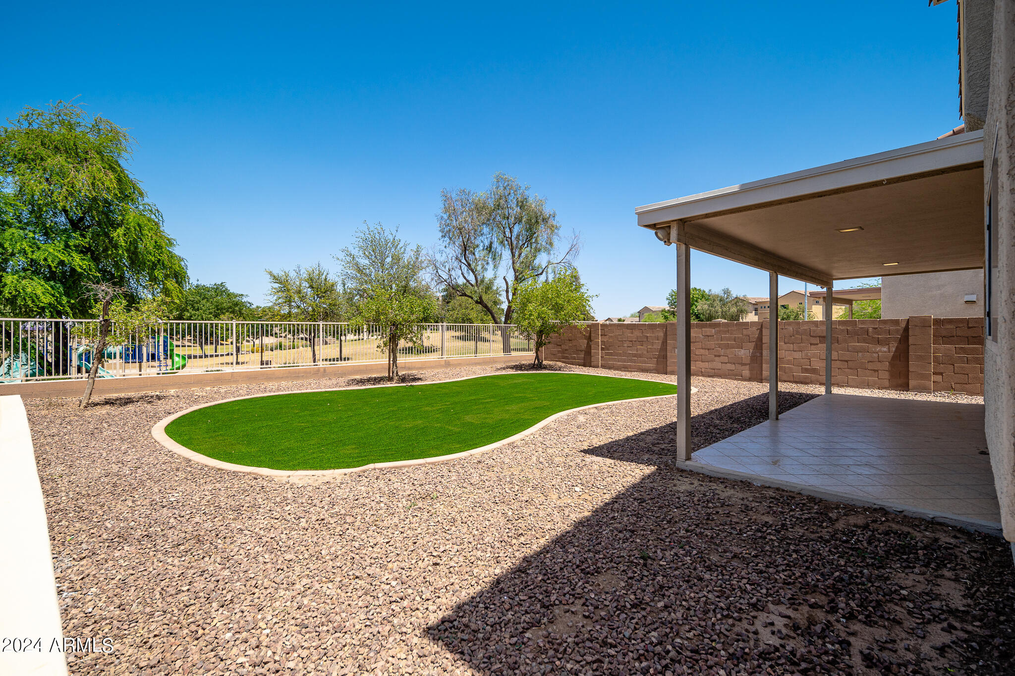 7208 West Crown King Road Phoenix, AZ 85043 - Photo 28 of 42 a view of a backyard with a garden