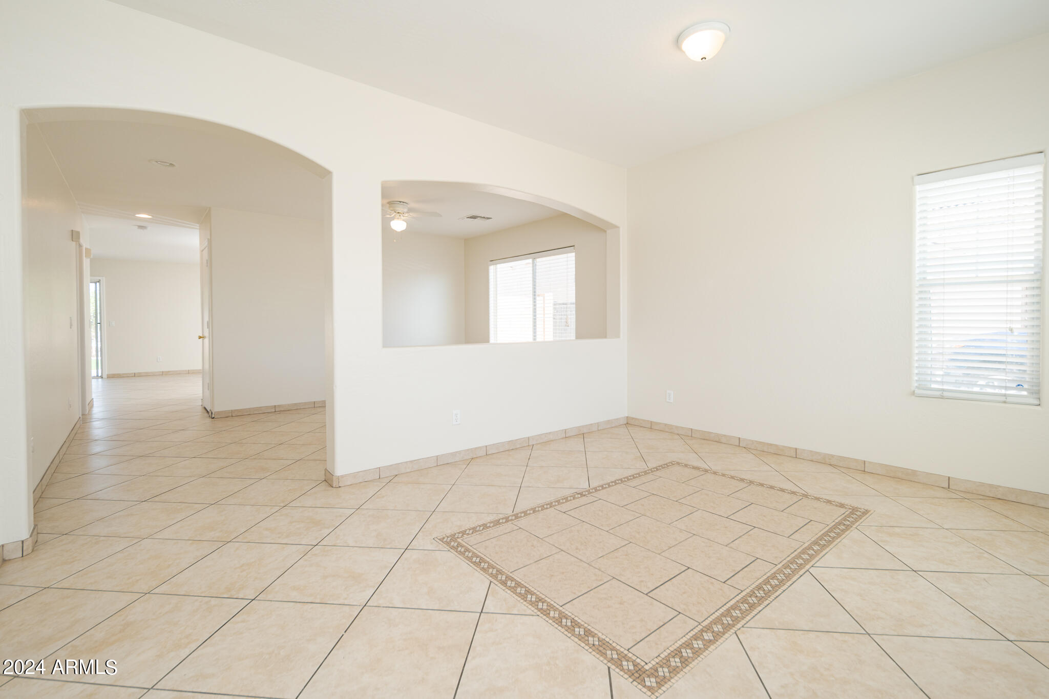 7208 West Crown King Road Phoenix, AZ 85043 - Photo 3 of 42 an empty room with windows
