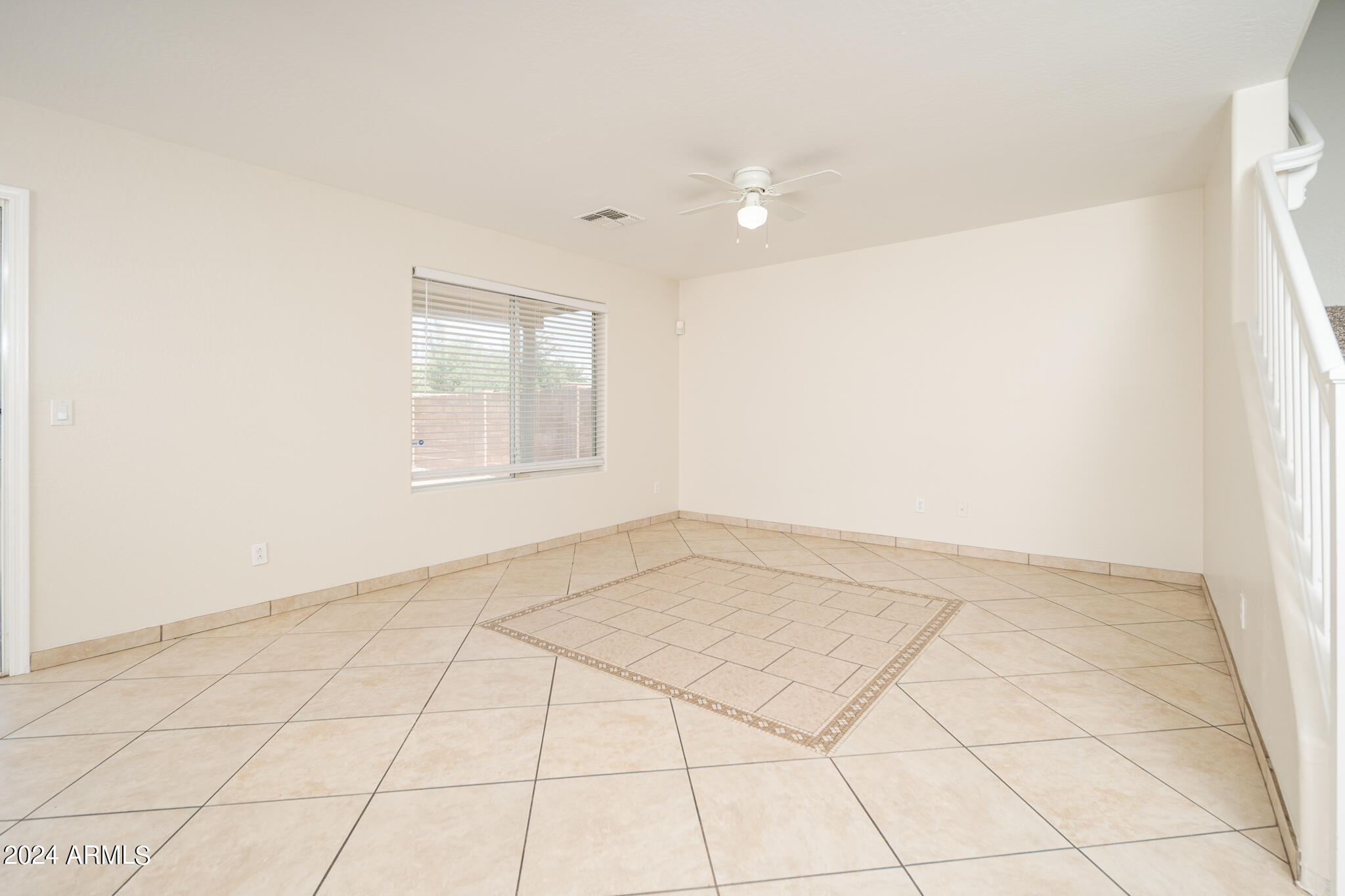 7208 West Crown King Road Phoenix, AZ 85043 - Photo 6 of 42 an empty room with windows