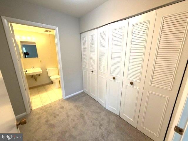 3320 Chiswick Court, Unit 611D Silver Spring, MD 20906 - Photo 19 of 38 a view of a bathroom with a sink and a tub