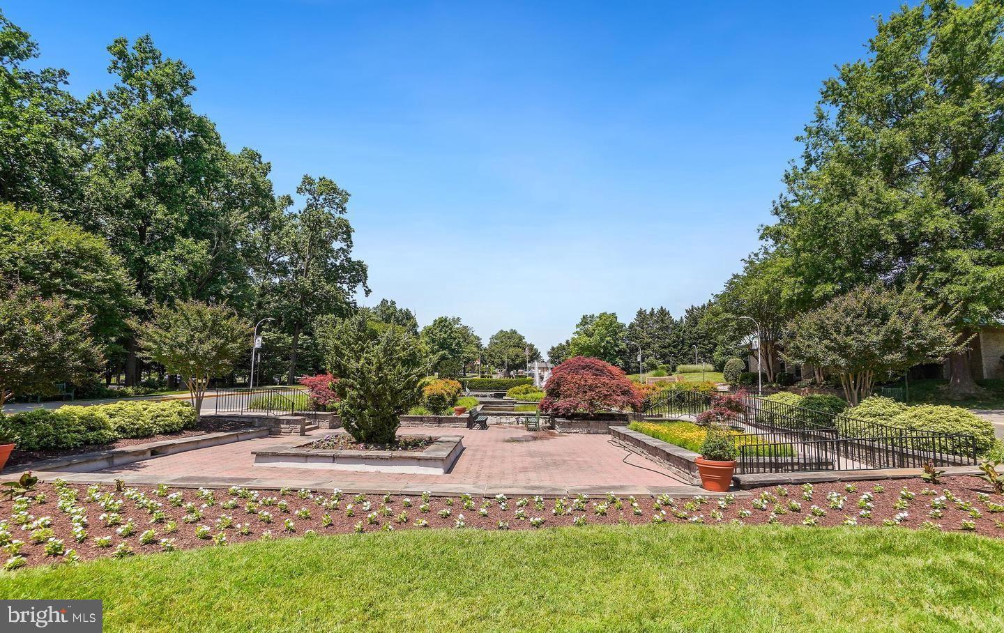 3320 Chiswick Court, Unit 611D Silver Spring, MD 20906 - Photo 27 of 38 a view of a park with large trees