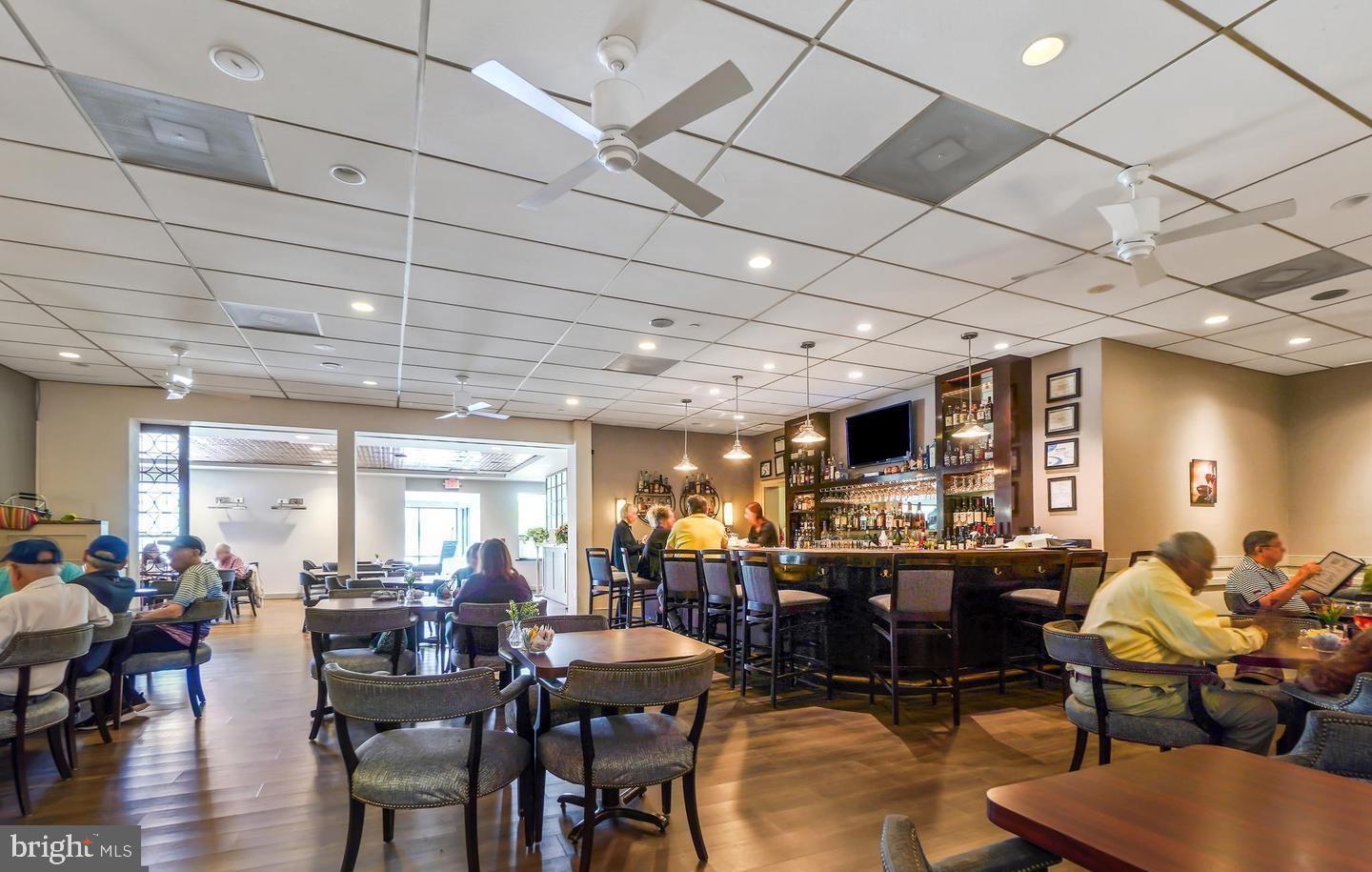 3320 Chiswick Court, Unit 611D Silver Spring, MD 20906 - Photo 28 of 38 a living room with lots of furniture and a large window