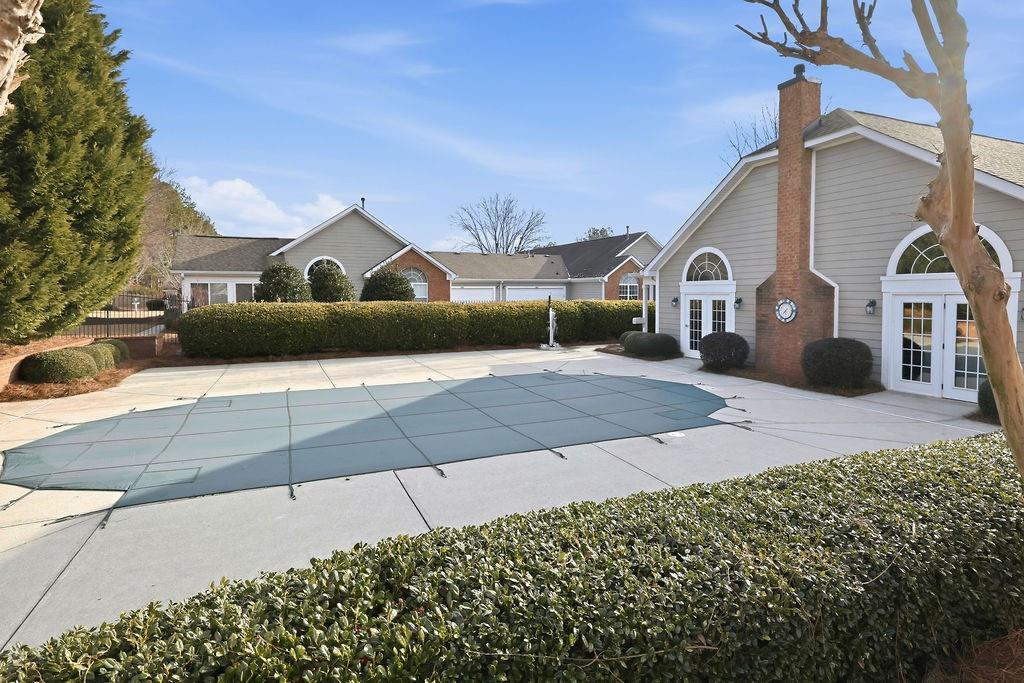 3057 Orchard Ridge Circle Duluth, GA 30096 - Photo 35 of 37 a front view of a house with a yard and garage