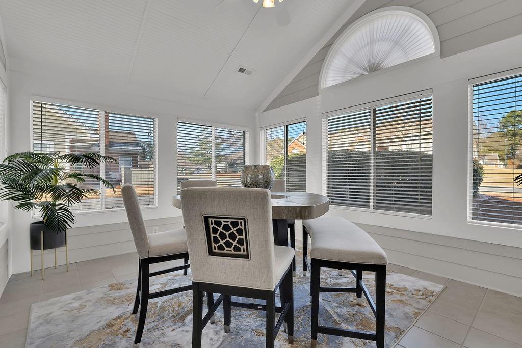 3057 Orchard Ridge Circle Duluth, GA 30096 - Photo 6 of 37 a view of a dining room with furniture window and outside view