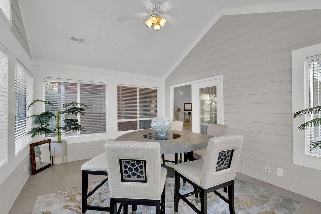 3057 Orchard Ridge Circle Duluth, GA 30096 - Photo 8 of 37 a dining room with furniture and floor to ceiling windows