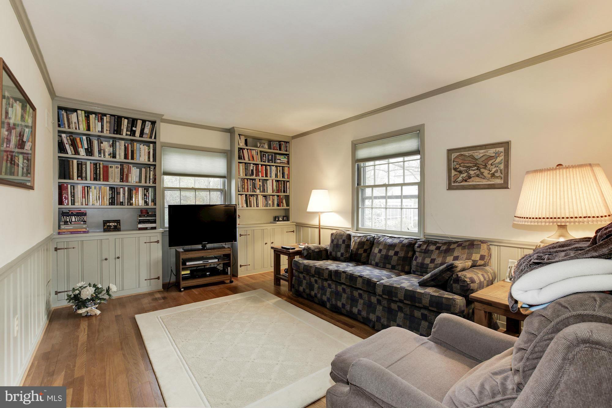 5502 Pollard Road Bethesda, MD 20816 - Photo 14 of 30 a living room with furniture and a flat screen tv