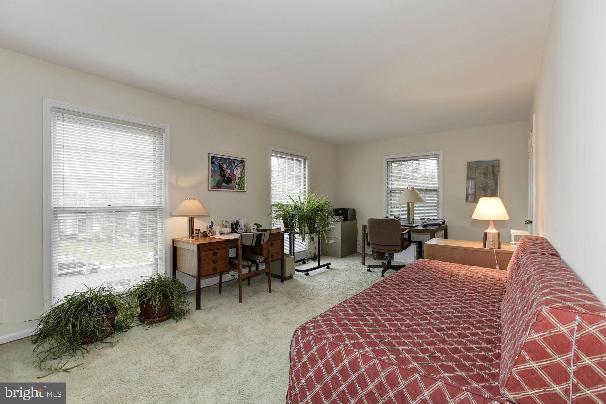 5502 Pollard Road Bethesda, MD 20816 - Photo 15 of 30 a bedroom with furniture a bed and a window