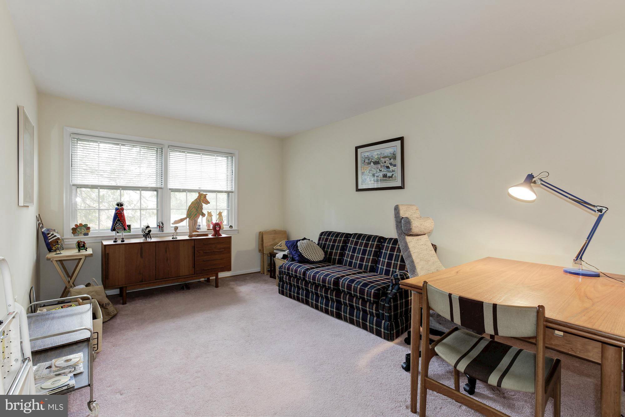 5502 Pollard Road Bethesda, MD 20816 - Photo 17 of 30 a living room with furniture and a window