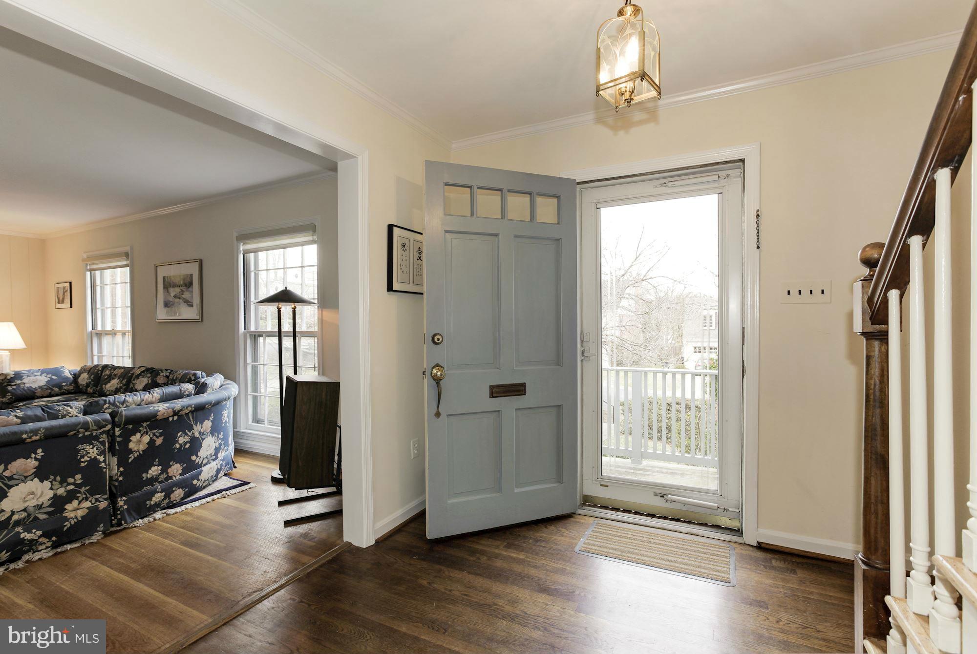 5502 Pollard Road Bethesda, MD 20816 - Photo 3 of 30 a view of a livingroom with wooden floor and a window