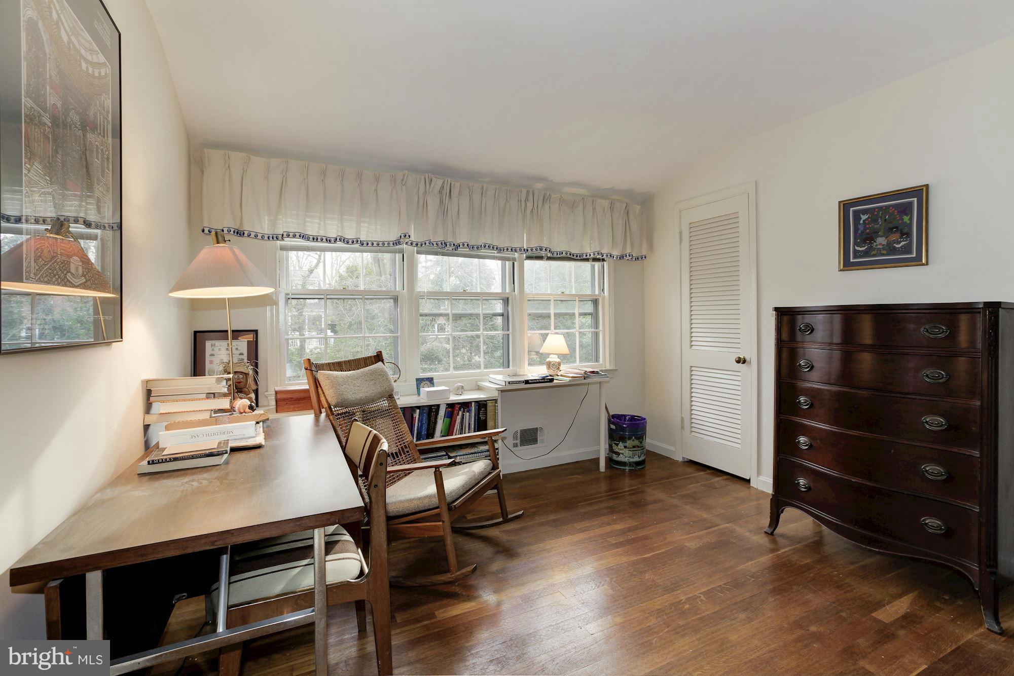 5502 Pollard Road Bethesda, MD 20816 - Photo 22 of 30 a view of a workspace with furniture and a window