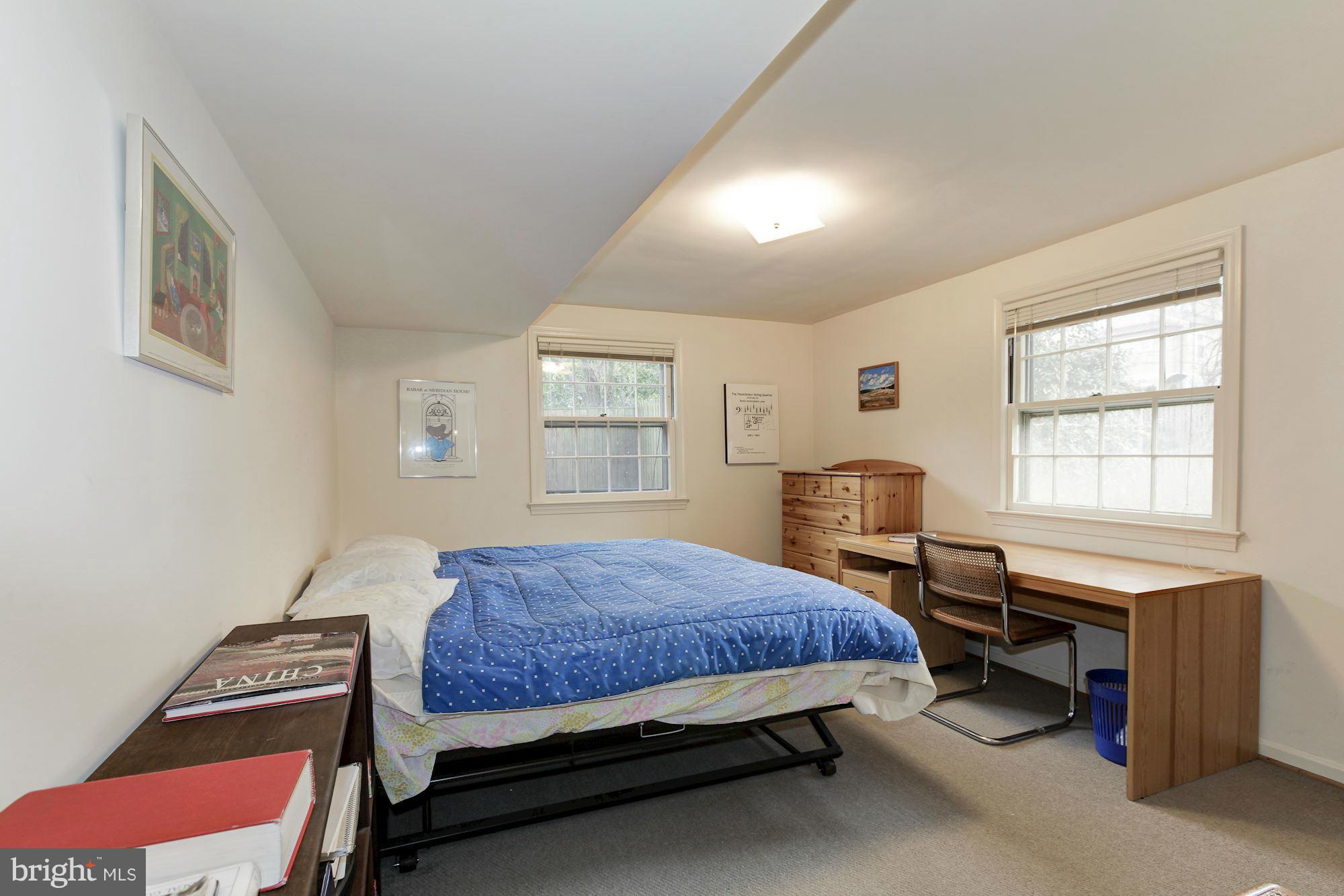 5502 Pollard Road Bethesda, MD 20816 - Photo 25 of 30 a bedroom with a bed and a window
