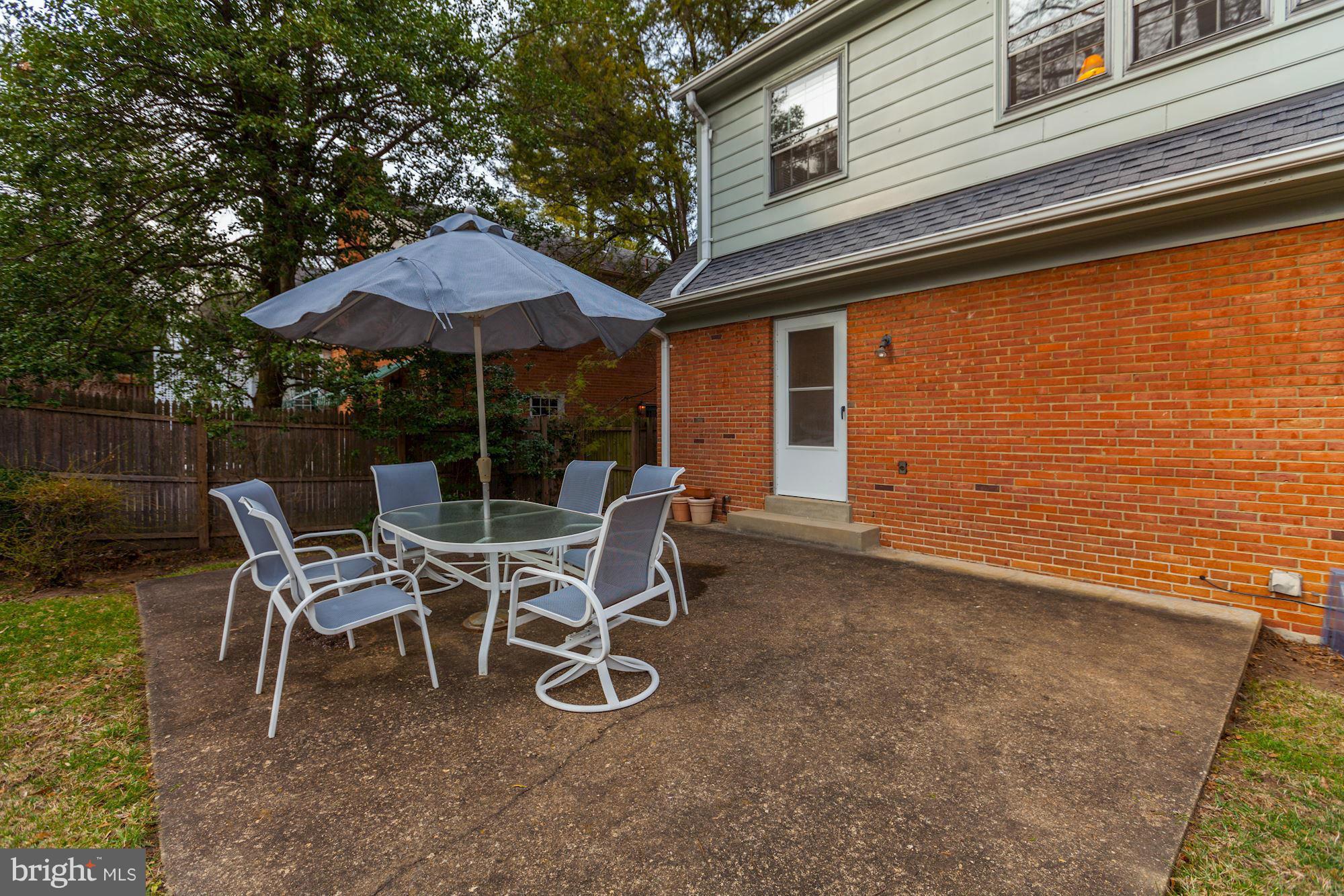 5502 Pollard Road Bethesda, MD 20816 - Photo 30 of 30 a couple of chairs sitting in front of a house